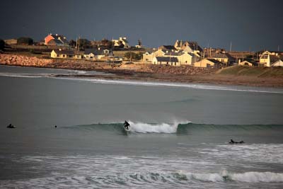 Surfing near Mossies in Brandon Bay